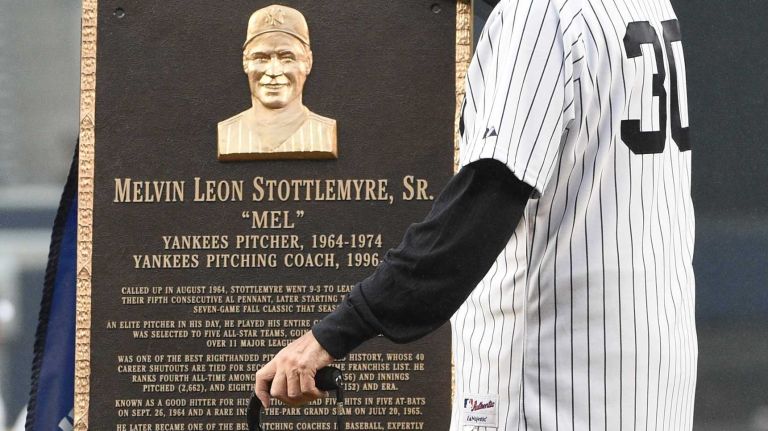 Former New York Yankees pitcher and pitching coach admires his Monument Park plaque during the 69th Old-Timers' Day at Yankee Stadium before a baseball game between the Yankees and the Detroit Tigers on Saturday, June 20, 2015.