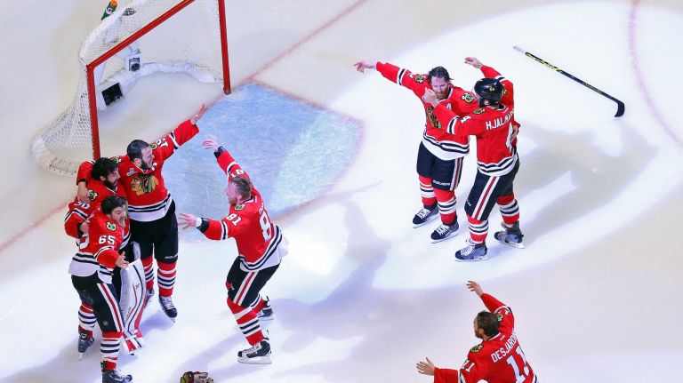 Stanley Cup Final: Blackhawks vs. Lightning 26 CHICAGO, IL - JUNE 15: The Chicago Blackhawks celebrate after defeating the Tampa Bay Lightning by a score of 2-0 in Game Six to win the 2015 NHL Stanley Cup Final at the United Center on June 15, 2015 in Chicago, Illinois. (Photo by Bruce Bennett/Getty Images)