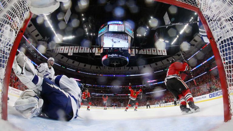 Stanley Cup Final: Blackhawks vs. Lightning 32 Chicago Blackhawks' Duncan Keith, right, celebrates after scoring past Tampa Bay Lightning goalie Ben Bishop, left, during the second period in Game 6 of the NHL hockey Stanley Cup Final series on Monday, June 15, 2015, in Chicago. (Bruce Bennett/Pool Photo via AP)