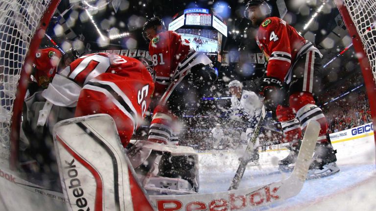 CHICAGO, IL - JUNE 10: Corey Crawford #50 of the Chicago Blackhawks makes a save against the Tampa Bay Lightning during Game Four of the 2015 NHL Stanley Cup Final at the United Center on June 10, 2015 in Chicago, Illinois. (Photo by Bruce Bennett/Getty Images)