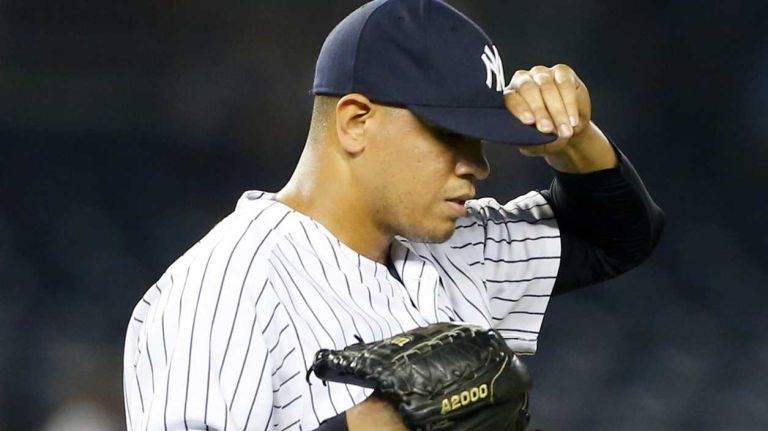Dellin Betances of the Yankees reacts after surrendering a run in the eighth inning against the Oakland Athletics at Yankee Stadium on Tuesday, June 3, 2014.