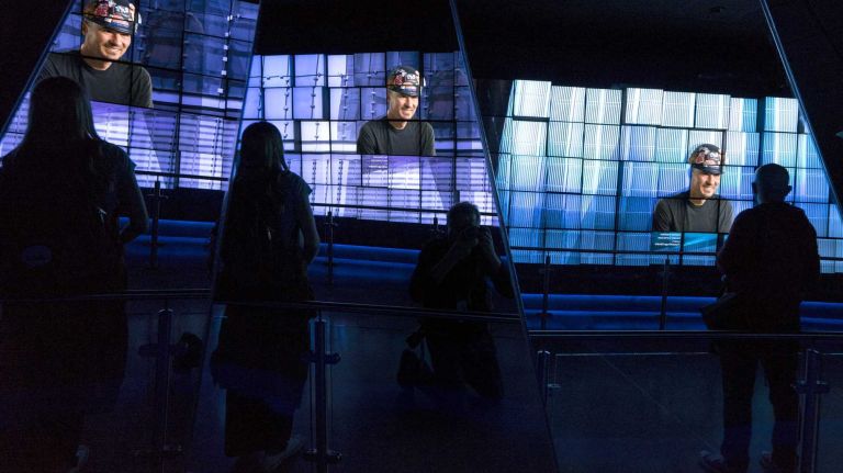 The video of a construction worker, one of the personal stories of men and women who built One World Trade Center, is part of a permanent presentation seen at the ground level of One World Trade Center, before visitors climb aboard elevators to ascend to One Word Observatory Wed., May 20, 2015. Nearly 25 hours of interviews that included 48 people make up the 14 minute running show. The observatory opens officially May 29.