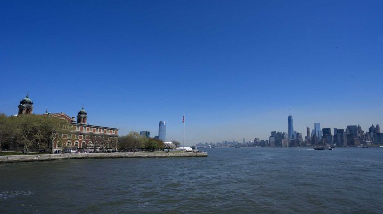 Ellis Island and lower Manhattan are seen from a Statue Cruises ferry Thursday, May 7, 2015.