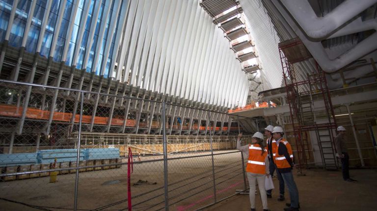 Interior view of the Oculus, framed by white ribs, next to the World Trade Center and 9/11 memorial site on May 6, 2015. 