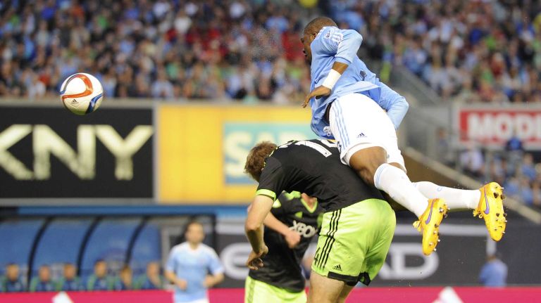 New York City FC vs. Sounders 25 New York City FC defender Kwame Watson-Siriboe (3) attempts to head the ball toward the goal over Seattle Sounders FC defender Chad Marshall (14) in an MLS game at Yankee Stadium on Sunday, May 3, 2015.