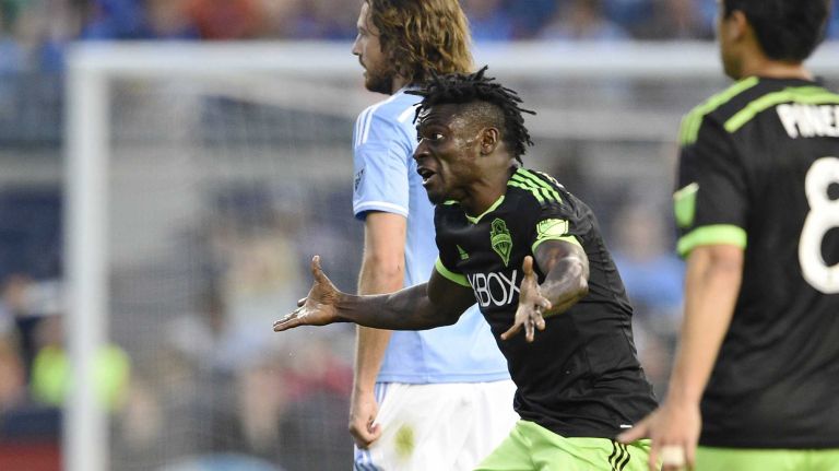 New York City FC vs. Sounders 39 Seattle Sounders FC forward Obafemi Martins (9) pleads with the official for a call in an MLS game against the New York City FC at Yankee Stadium on Sunday, May 3, 2015.
