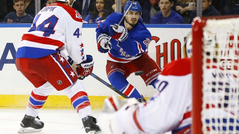 Rangers vs. Capitals: Game 2 of round 2 of Stanley Cup playoffs 27 Chris Kreider #20 of the New York Rangers shoots the puck in the third period against the Washington Capitals during Game 2 of the Eastern Conference semifinals at Madison Square Garden on Saturday, May 2, 2015.
