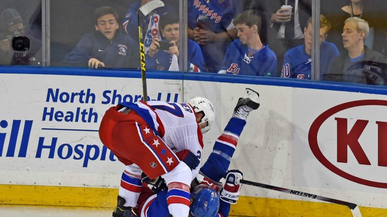 Rangers vs. Capitals: Game 2 of round 2 of Stanley Cup playoffs 34 The Washington Capitals' Karl Alzner and the New York Rangers' Rick Nash get tangled up during the second period of Game 2 of the Eastern Conference semifinals at Madison Square Garden on Saturday, May 2, 2015.
