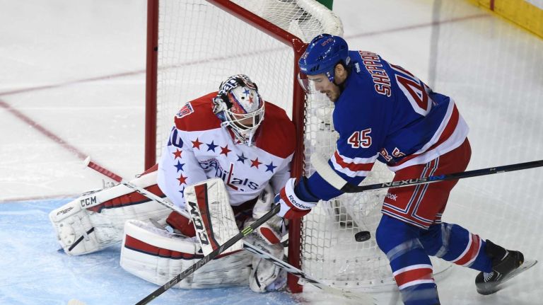 Rangers vs. Capitals: Game 2 of round 2 of Stanley Cup playoffs 35 The New York Rangers' James Sheppard tries to put the puck past the Washington Capitals' Braden Holtby during the first period of Game 2 of the Eastern Conference semifinals at Madison Square Garden on Saturday, May 2, 2015.