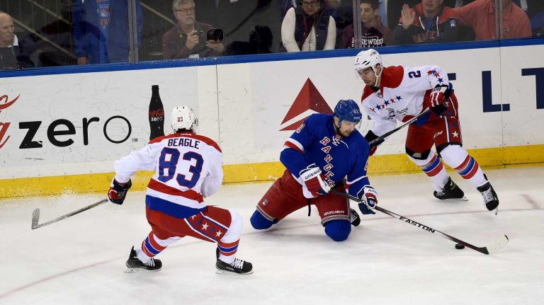 Rangers vs. Capitals: Game 2 of round 2 of Stanley Cup playoffs 36 The New York Rangers' Rick Nash fights for the puck with the Washington Capitals' Jay Beagle and the Washington Capitals' Matt Niskanen during the first period of Game 2 of the Eastern Conference semifinals at Madison Square Garden on Saturday, May 2, 2015.