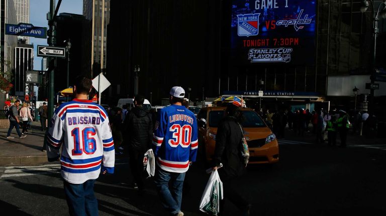 Rangers fans head to Game 1 of the Eastern Conference semifinals against the Washington Capitals during the 2015 NHL Stanley Cup playoffs at Madison Square Garden on April 30, 2015.