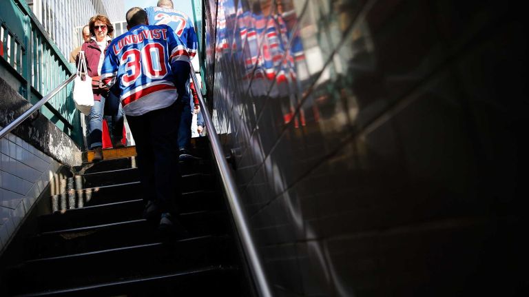 Rangers fans head to Game 1 of the Eastern Conference semifinals against the Washington Capitals during the 2015 NHL Stanley Cup playoffs at Madison Square Garden on April 30, 2015.