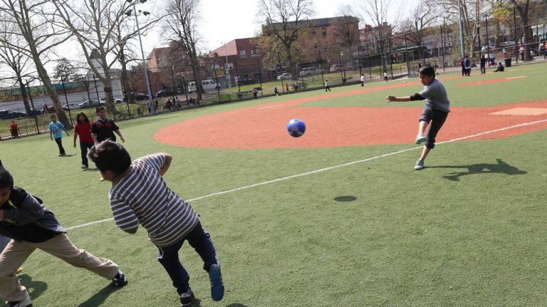 A game of after school soccer at Park of the Americas between 103rd and 104th street near 41st Ave. in North Corona, Queens, Tuesday, April 21, 2015.