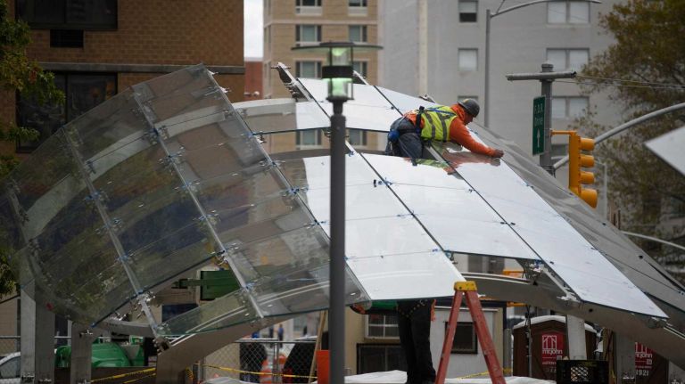 Contractors work on an entrance to the Second Avenue subway at East 96th Street on Tuesday, Oct. 25, 2016. 