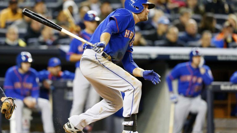 Lucas Duda #21 of the New York Mets follows through on a third-inning base hit against the New York Yankees at Yankee Stadium on Sunday, April 26, 2015.