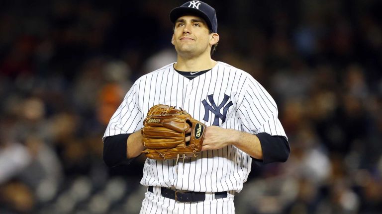 Nathan Eovaldi #30 of the New York Yankees looks on after surrendering a first-inning run against the New York Mets at Yankee Stadium on Sunday, April 26, 2015.