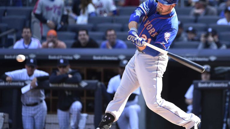 New York Mets first baseman Lucas Duda hits a solo home run against the New York Yankees during the first inning of a baseball game at Yankee Stadium on Saturday, April 25, 2015.