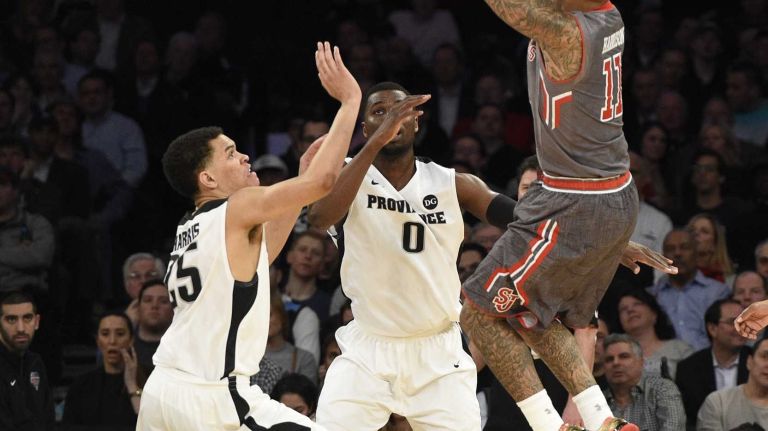 Big East Tournament quarterfinal: St. John's vs. Providence 20 St. John's Red Storm guard D'Angelo Harrison puts up a shot against the Providence Friars in a Big East quarterfinal men's basketball game at Madison Square Garden on Thursday, March 12, 2015.