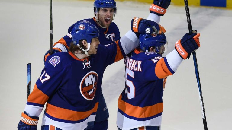 Eastern Conference quarterfinals Game 6: Islanders vs. Capitals 69 New York Islanders' John Tavares, Matt Martin and Cal Clutterbuck celebrate Clutterbuck's goal in the third period against the Washington Capitals Game 6 of the Eastern Conference quarterfinals at Nassau Coliseum on Saturday, April 25, 2015.