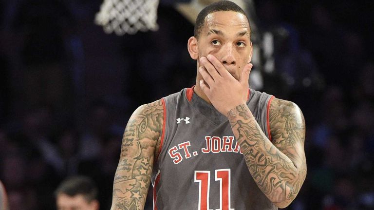 Big East Tournament quarterfinal: St. John's vs. Providence 28 St. John's Red Storm guard D'Angelo Harrison looks on from the courtn against the Providence Friars in a Big East quarterfinal men's basketball game at Madison Square Garden on Thursday, March 12, 2015.