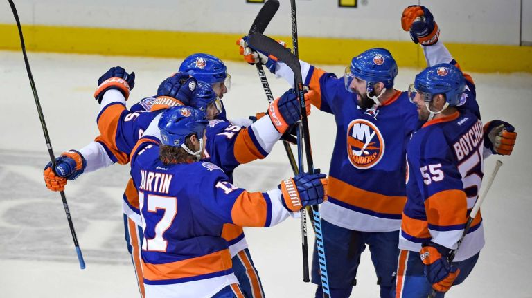 Eastern Conference quarterfinals Game 6: Islanders vs. Capitals 70 New York Islanders' John Tavares, Matt Martin, Cal Clutterbuck, Nick Leddy and Johnny Boychuk celebrate Clutterbuck's goal in the third period against the Washington Capitals during Game 6 of the Eastern Conference quarterfinals at Nassau Coliseum on Saturday, April 25, 2015.