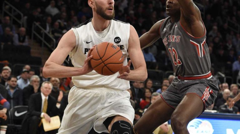 Big East Tournament quarterfinal: St. John's vs. Providence 30 Providence Friars forward Carson Desrosiers is defended by St. John's Red Storm forward Chris Obekpa in a Big East quarterfinal men's basketball game at Madison Square Garden on Thursday, March 12, 2015.