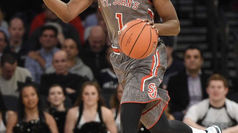 Big East Tournament quarterfinal: St. John's vs. Providence 31 St. John's Red Storm guard Phil Greene IV dribbles the ball against the Providence Friars in a Big East quarterfinal men's basketball game at Madison Square Garden on Thursday, March 12, 2015.
