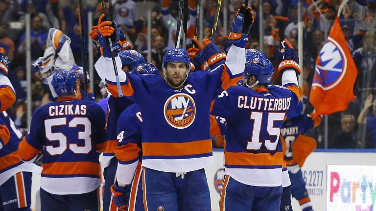 Eastern Conference quarterfinals Game 6: Islanders vs. Capitals 84 John Tavares of the New York Islanders celebrates with his teammates after defeating the Washington Capitals in Game 6 of the Eastern Conference quarterfinals at Nassau Coliseum on Saturday, April 25, 2015.