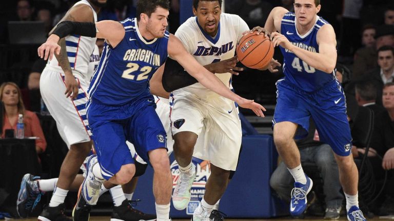 DePaul Blue Demons forward Myke Henry is defended by Creighton Bluejays guard Avery Dingman in the first round of the Big East basketball tournament at Madison Square Garden on Wednesday, March 11, 2015.