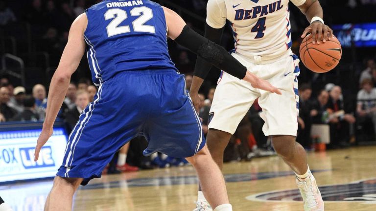 DePaul Blue Demons forward Myke Henry is defended by Creighton Bluejays guard Avery Dingman in the first round of the Big East basketball tournament at Madison Square Garden on Wednesday, March 11, 2015.