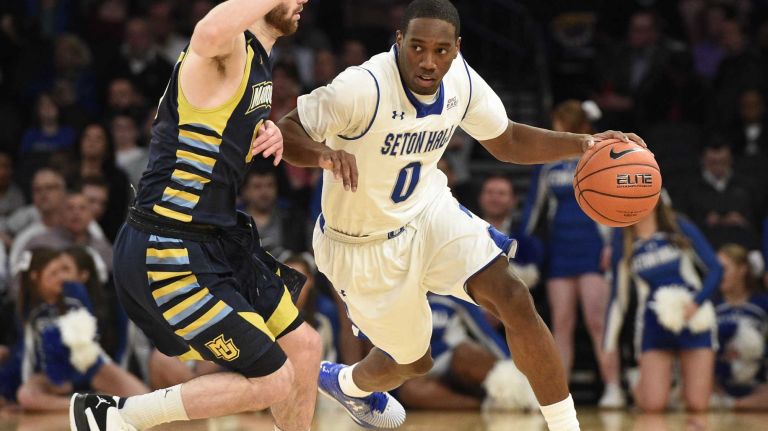Big East Tournament first round: Marquette vs. Seton Hall 47 Seton Hall Pirates forward Michael Nzei is defended by Marquette Golden Eagles guard Matt Carlino in the first round of the Big East basketball tournament at Madison Square Garden on Wednesday, March 11, 2015.