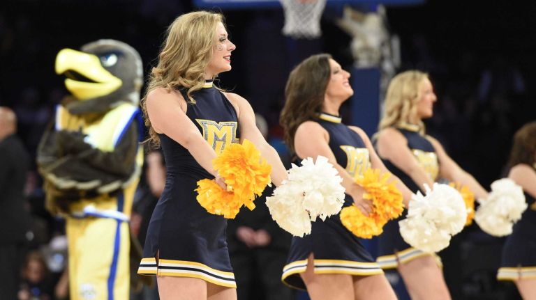 Big East Tournament first round: Marquette vs. Seton Hall 54 Marquette Golden Eagles cheerleaders perform during a timeout against the Seton Hall Pirates in the first round of the Big East basketball tournament at Madison Square Garden on Wednesday, March 11, 2015.