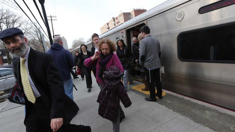City Living: Kew Gardens photos 29 Commuters exit the LIRR train in Kew Gardens, Queens, Monday, April 13, 2015