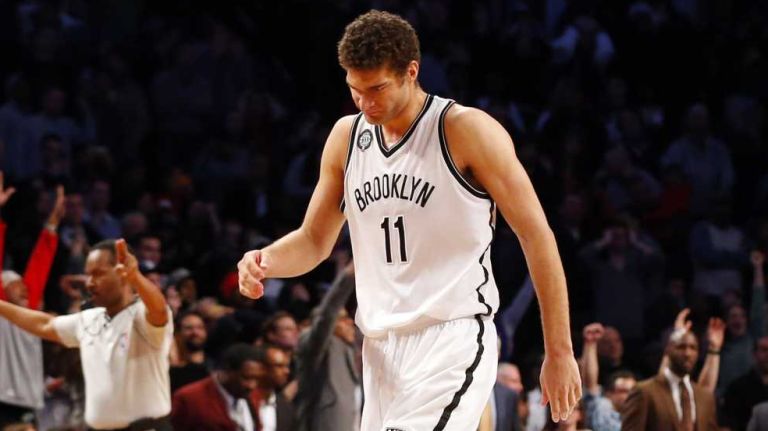 Brook Lopez of the Brooklyn Nets walks off the court after a missing a shot at the buzzer against the Philadelphia 76ers at Barclays Center on Friday, Jan. 9, 2015.