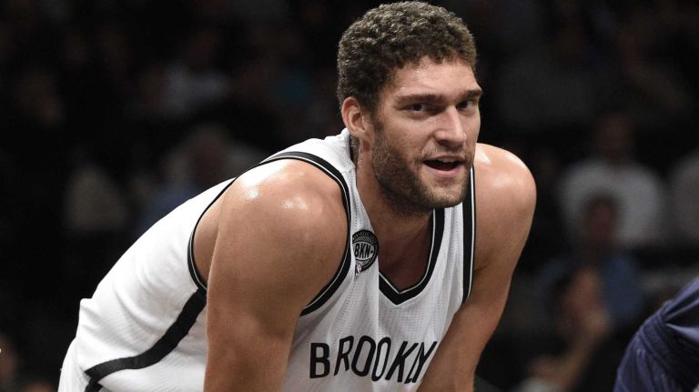 Brooklyn Nets center Brook Lopez looks on against the Atlanta Hawks in the first half of an NBA game at Barclays Center on Friday, Dec. 5, 2014.