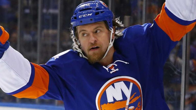 Islanders vs. Flyers 12 Michael Grabner of the New York Islanders celebrates his first-period goal against the Philadelphia Flyers at Nassau Coliseum on Monday, Jan. 19, 2015.