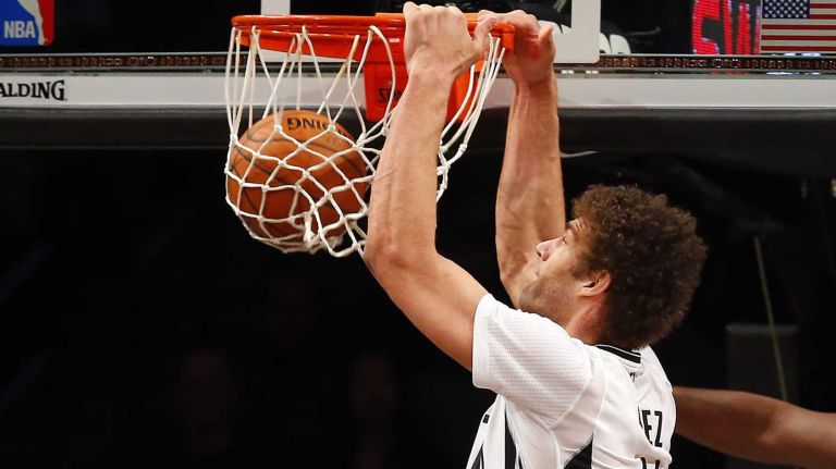 Brook Lopez of the Brooklyn Nets dunks the ball in the first half against the Indiana Pacers at Barclays Center on Tuesday, March 31, 2015.