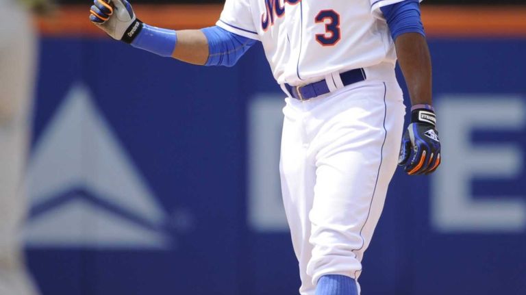 New York Mets Curtis Granderson stands on second base after his double in the seventh inning against the Philadelphia Phillies in an MLB baseball game at Citi Field on Wednesday, July 30, 2014.