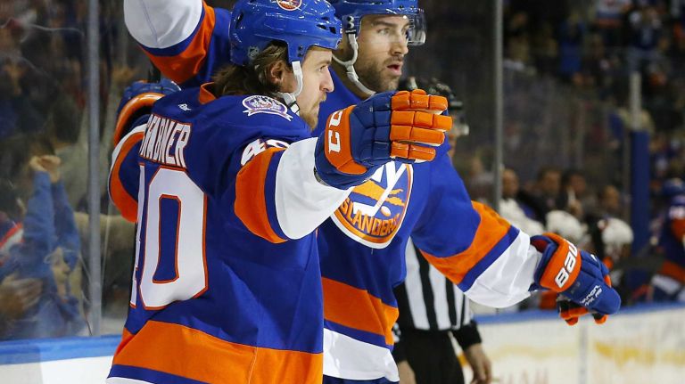 Islanders vs. Flyers 16 Michael Grabner of the New York Islanders celebrates his first-period goal against the Philadelphia Flyers with teammate Johnny Boychuk at Nassau Coliseum on Monday, Jan. 19, 2015.