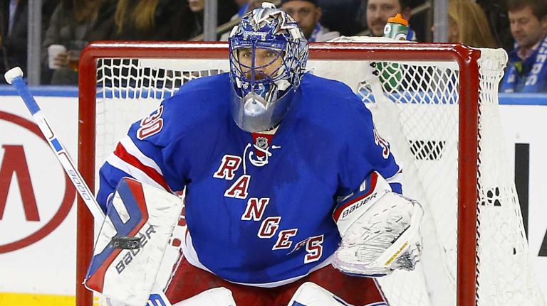Henrik Lundqvist of the New York Rangers makes a save in the second period against the Ottawa Senators at Madison Square Garden on Tuesday, Jan. 20, 2015.