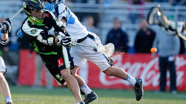 NY Lizards vs. Ohio Machine 35 HEMPSTEAD, NY - APRIL 12: Matt Poskay #15 of the New York Lizards fires the ball for a goal against the Ohio Machine at James M. Shuart Stadium on April 12, 2015 in Hempstead, New York. Lizards defeated the Machines 14-8. (Photo by Mike Stobe/Getty Images)