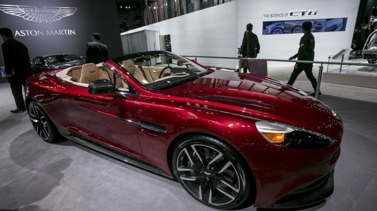 Putting out more than 568 hp with its AM29 V-12 engine, the Aston Martin Vanquish has a top speed of 201 mph, and can go 0 to 60 in 3.6 seconds. Prices start at $279,995.