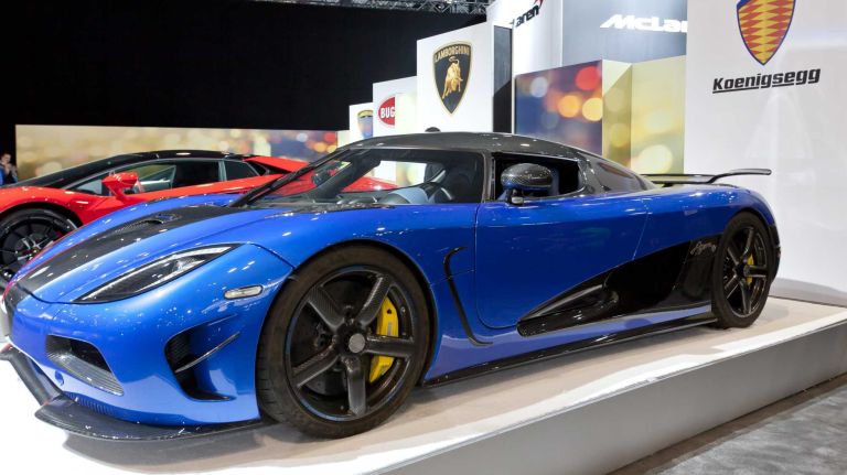 Speedy and stunning, the hand-built Koenigsegg Agera R has a 5.0L twin turbocharged V-8 engine that produces a massive 940 hp. It has a top speed of 275 mph. There is no specific price for the vehicle, but an Agera S recently sold in Singapore for $4.2 million.