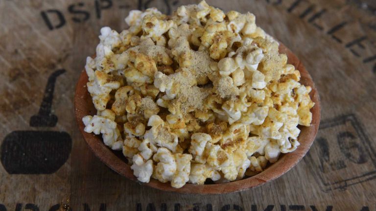 Chef Shane Lyons sprinkles his 