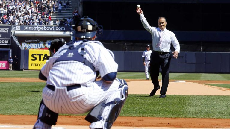 Yankees Opening Day in 2015 46 Former Yankees manager Joe Torre throws the ceremonial first pitch to Brian McCann before the Opening Day game against the Toronto Blue Jays at Yankee Stadium on Monday, April 6, 2015.