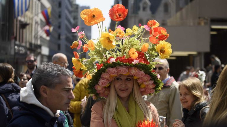 Participants and spectators wander along Fifth Avenue during the annual Easter Parade and Bonnet Festival in Manhattan, Sunday, April 05, 2015. The pageant is a New York City tradition that stretches back to the 1870s.
