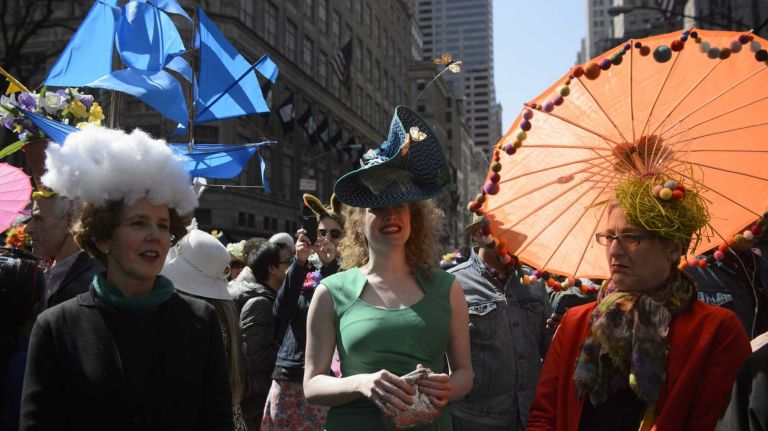 Participants and spectators wander along Fifth Avenue during the annual Easter Parade and Bonnet Festival in Manhattan, Sunday, April 05, 2015. The pageant is a New York City tradition that stretches back to the 1870s.