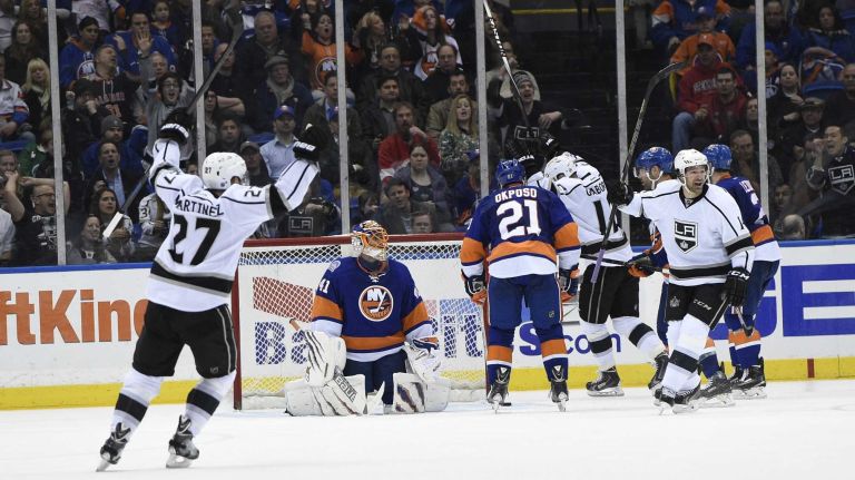 New York Islanders goalie Jaroslav Halak reacts as the Los Angeles Kings celebrate a goal by center Anze Kopitar in the third period of an NHL hockey game at Nassau Coliseum on Thursday, March 26, 2015. The Kings defeated the Islanders 3-2.