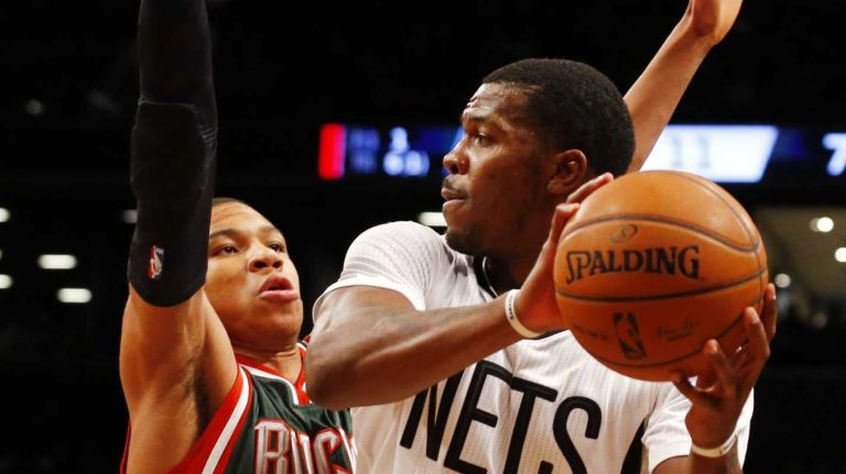 Joe Johnson of the Brooklyn Nets controls the ball in the first half against Giannis Antetokounmpo of the Milwaukee Bucks at Barclays Center on Friday, March 20, 2015.