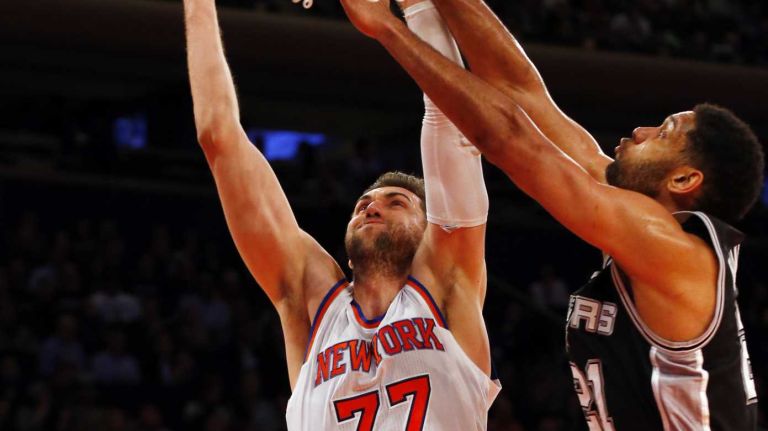 Andrea Bargnani of the New York Knicks puts up a shot against Tim Duncan of the San Antonio Spurs at Madison Square Garden on Tuesday, March 17, 2015.